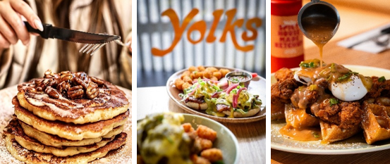 The image shows a plate of fluffy pancakes, a serving of crispy chicken, a side of roasted vegetables, and a spicy salsa, all accompanied by a bottle of YOIKS ketchup.

AI-generated content may be incorrect.
